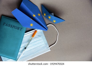 Medical Face Mask,passport, Vaccine , Paper Plane In EU European Union Flag - Concept Coronavirus Plans COVID Vaccination Passport, New Flight Ban Rules Travel, Aviation Business