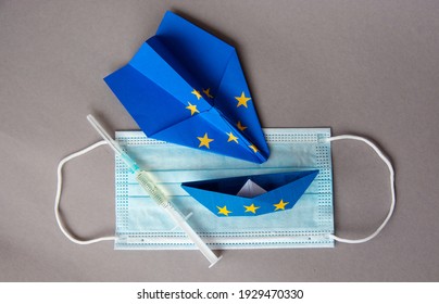 Medical Face Mask,passport, Vaccine , Paper Plane In EU European Union Flag - Concept Coronavirus Plans COVID Vaccination Passport, New Flight Ban Rules Travel, Aviation Business