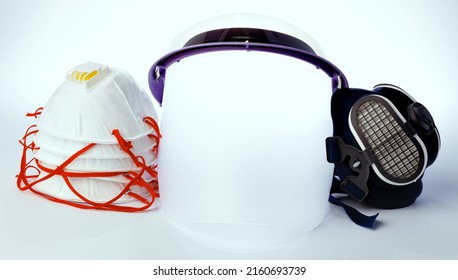 Medical Face Shield And Protective Masks On White Background