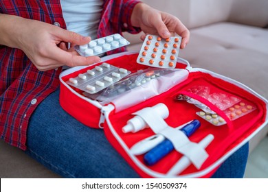 Medical first aid kit with medicine and pills for pain and illness