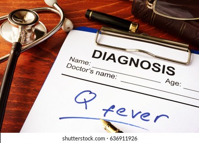 Medical Form With Diagnosis Q Fever On A Table.