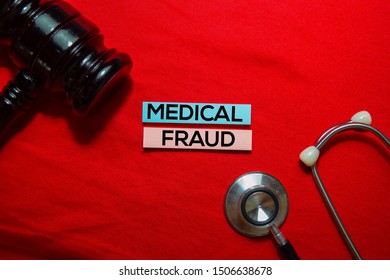 Medical Fraud Text On Sticky Notes With Stethoscope And Gavel Isolated On Office Desk.
