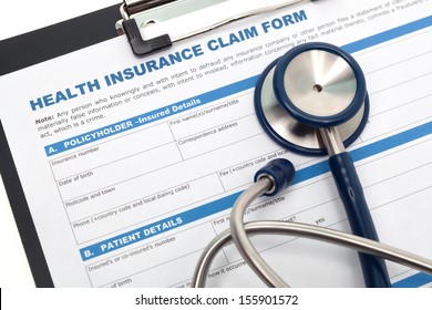 Medical And Health Insurance Claim Form With Stethoscope On Clipboard