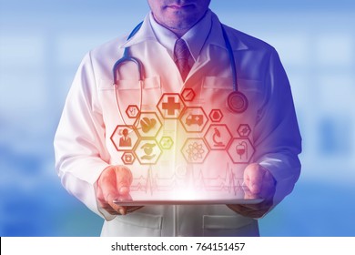 Medical Healthcare Concept - Doctor in hospital with icons in modern interface showing symbol of medicine, innovation, treatment, emergency service, data analysis and patient health.