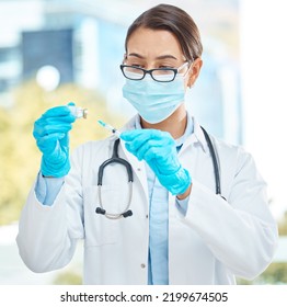 Medical, Healthcare And Covid Vaccine By Woman Doctor Working During Corona Pandemic In A Hospital. Young Health Care Worker Holding Medical Innovation, Confident While Prepare Cure Injection