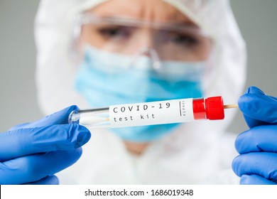Medical healthcare technologist holding COVID-19 swab collection kit,wearing white protective suit mask and gloves,test tube for taking OP NP patient specimen sample,PCR DNA test process illustration
