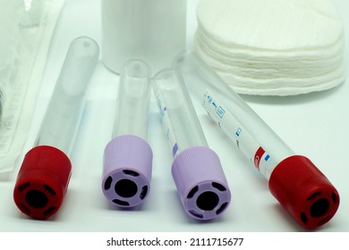 Medical items syringes test tubes gloves cotton napkins on the table