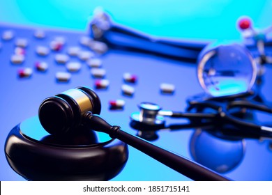 Medical Jurisprudence Concept. Legal Definition Of Medical Malpractice. Judges Gavel And Stethoscope.