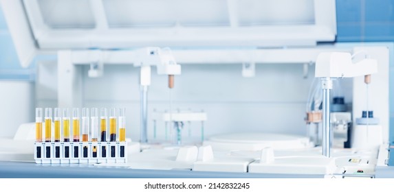 Medical Lab Equipment Biomedical Banner. Test Tubes With Blood For Automatic Biochemical Analyzer.