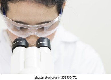 Medical Laboratory Scientist, Asian Scientist Looking In Microscope, Science Laboratory Concept, Copy Space