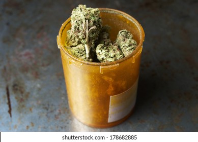 Medical Marijuana And Cannabis Bud In Prescription Pill Bottle