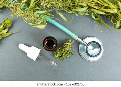 Medical Marijuana Cannabis Cbd Oil And Stethoscope. Alternative Medicine For Pain Relief