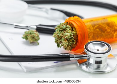 Medical Marijuana Close Up Cannabis Buds With Doctors Prescription For Weed. Medicinal Pot With Stethoscope. Selective Focus With Copy Space.