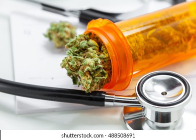 Medical Marijuana Close Up Cannabis Buds With Doctors Prescription For Weed. Medicinal Pot With Stethoscope. Selective Focus With Copy Space.