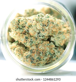 Medical Marijuana Flower Buds. Recreational Marijuana Strain. Cannabis Strain. Weed Bud In The Glass Jar. Dispensary Menu. Hemp Buds.