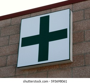 Medical Marijuana Generic Green Cross Storefront Sign On Outside Of Pharmacy Dispensary