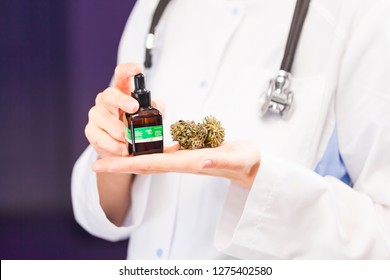Medical Marijuana In The Hand Of A Doctor. Cannabis Oil Cbd Alternative Medicine