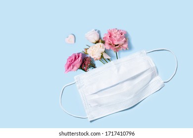 A Medical Mask With A Bouquet Of Flowers Inside. Keep Your Distance - Be Healthy And Happy. A Holiday Card With A Medical Bias.