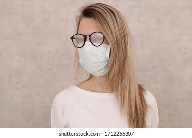 Medical mask and Glasses fogging. Coronavirus prevention, Protection. New habits during Self-isolation , Quarantine