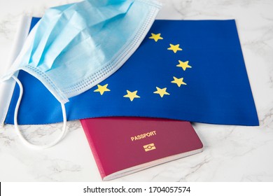 Medical Mask On European Union Flag And Passport Coronavirus Outbreak