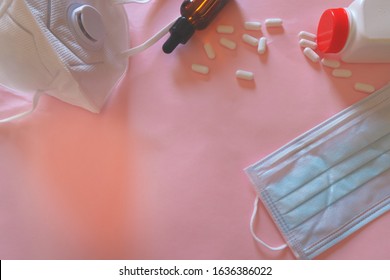 Medical Mask And Vitamin C Pills On A Pink Background To Show The Concept Of Infection Control, Novel Coronavirus Or Wuhan Coronavirus (2019-nCoV) Outbreak And Global Health Emergency