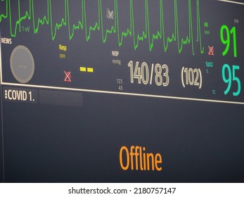 Medical Monitor Screen Showing Vital Signs Including Pulse Oximetry Reading And ECG Waveform.