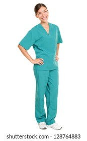 Medical nurse isolated in full body length in green scrubs on pure white background. Multiracial Asian and Caucasian female medical professional doctor or nurse smiling happy and joyful