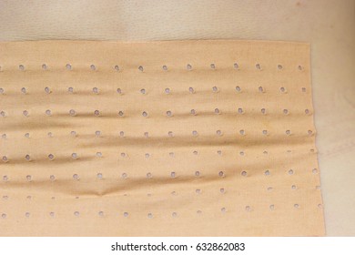 Medical Objects, Health Problems Concept. Closeup Of Heating Pad Plaster Bandage On Back