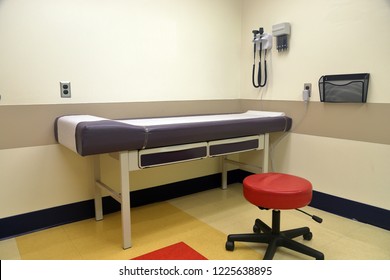 Medical Patient Exam Table In Doctor's Office