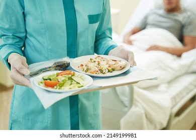 Medical Person Keeping Tray With Food In Hospital