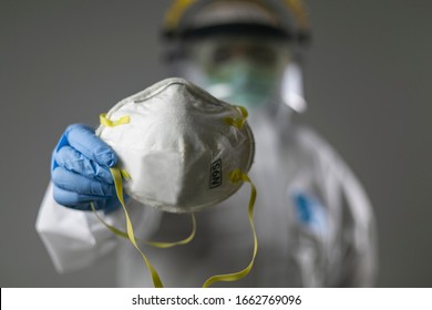 Medical Personnel Holding A Mask N-95