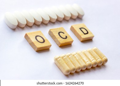 The Medical Phrase Ocd On Different Pills And Capsules Background. Pharmacy Theme, Health Care, Drug Prescription For Treatment Medication And Medicament