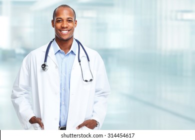 Medical physician doctor man over hospital background.