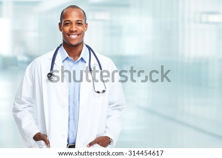 Medical physician doctor man over hospital background.