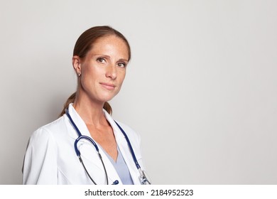 Medical physician doctor woman over white background, closeup portrait - Shutterstock ID 2184952523