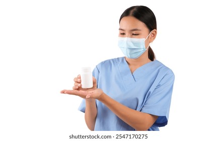 Medical professional with mask holding a pill bottle in hand, isolated on white background.