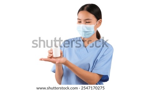 Medical professional with mask holding a pill bottle in hand, isolated on white background.
