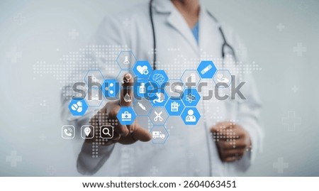 Medical professional using interactive hexagon interface for smart digital healthcare network and innovation in modern medicine