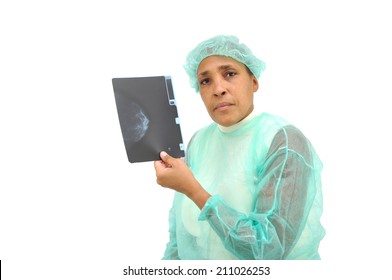 Medical Professional Woman looking at camera Wearing Hospital Gown and Cap holding Breast Exam X-ray isolated on white background - Powered by Shutterstock