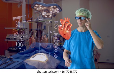 Medical Professionals Are Using Modern AR Technology And Holograms, Treating And Providing Consultation On The Treatment Of Heart Problems Of Elderly Patients In The Intelligent Hospital.