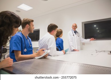 Medical Professor Teaching Young Students At The University