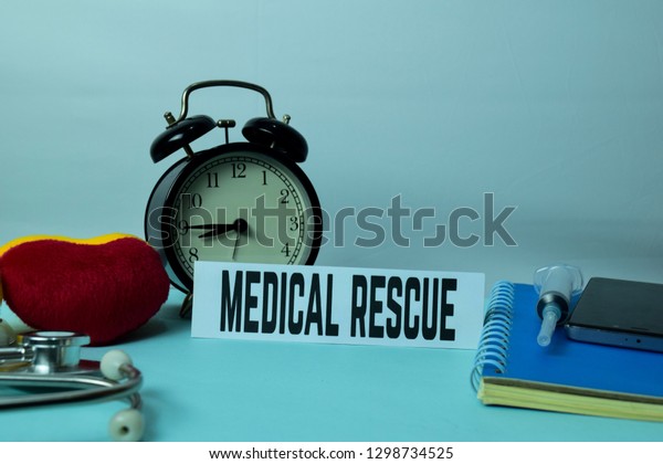 Medical Rescue Planning on Background of\
Working Table with Office Supplies. Medical and Healthcare Concept\
Planning on White\
Background