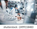 Medical, research and scientist in laboratory with microscope, observation and experiment for study. Healthcare, employees or doctor with machine for examine cells, microorganisms and investigation