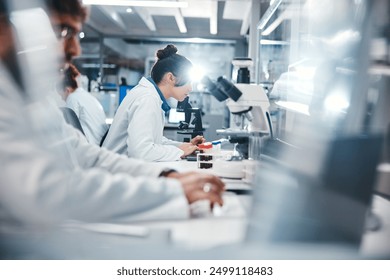 Medical, research and scientist in laboratory with microscope, observation and experiment for study. Healthcare, employees or doctor with machine for examine cells, microorganisms and investigation