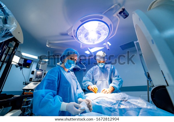 Medical robot. Robotic Surgery. Medical operation\
involving robot. Minimally invasive robotic surgery with the\
robotic system.