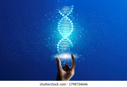 Medical science and biotechnologies concept. Glowing DNA molecule in male hand, blue background. Collage