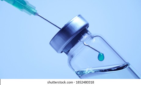 Medical Scientist Mix Vaccine In The Vile. Lab Developing Research Of Vaccine Against Coronavirus, COVID-19, SARS-CoV-2, 2019-ncov. Pre-clinical Evaluation And Clinical Phase Trials Development Test