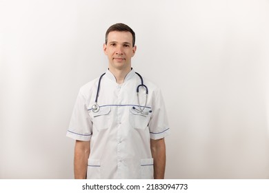 Medical Services. Male Surgeon. Portrait Of A Young Doctor With A Stethoscope. Copy Space.