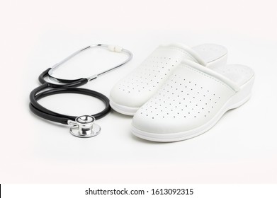Medical shoes and a stethoscope, useful for medical concepts.