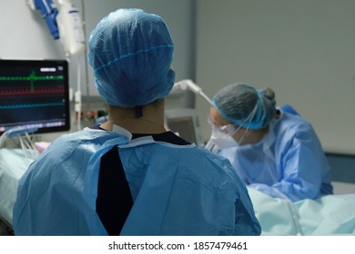  A medical staff member works at the intensive care unit for patients suffering from the coronavirus disease (COVID-19) in Thoracic Diseases Hospital of Athens in Greece on November 6, 2020. - Shutterstock ID 1857479461